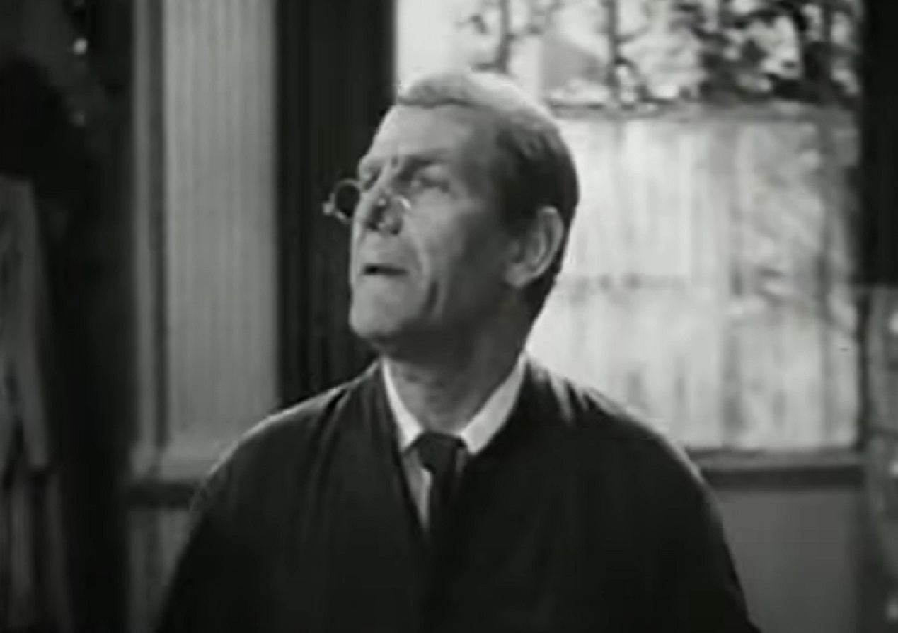 Screenshot of Will Hay looking at side - from Oh, Mr Porter! (1937)