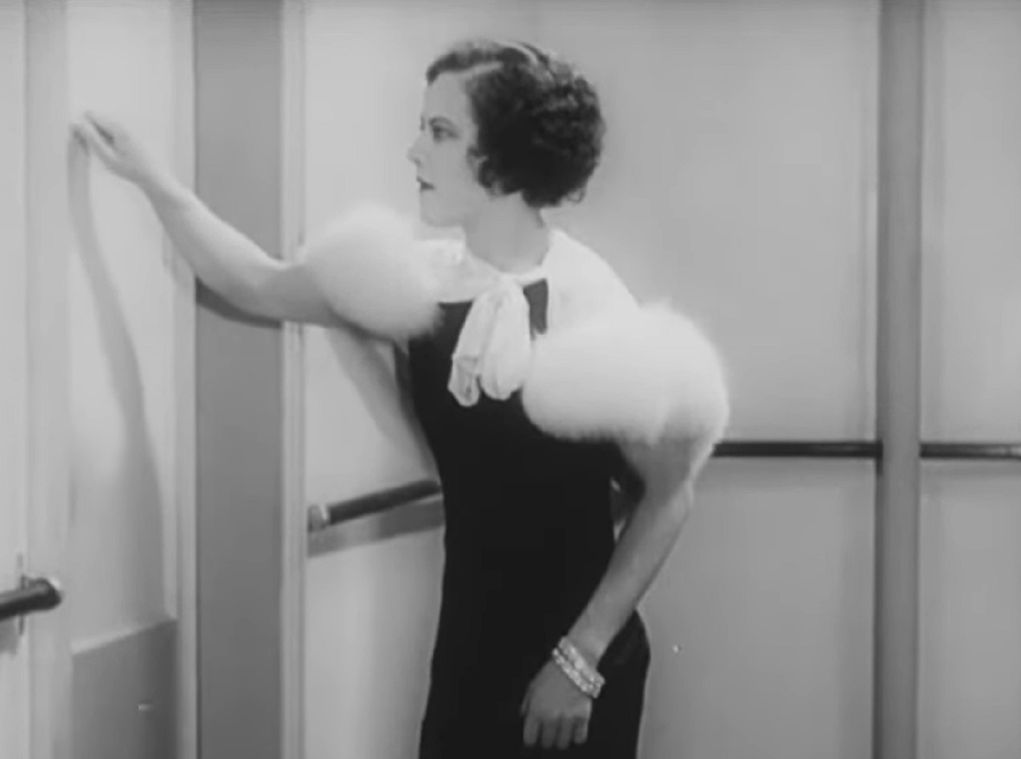 Screenshot of Fredi Washington standing in  front of a door - from Ouanga (1936)
