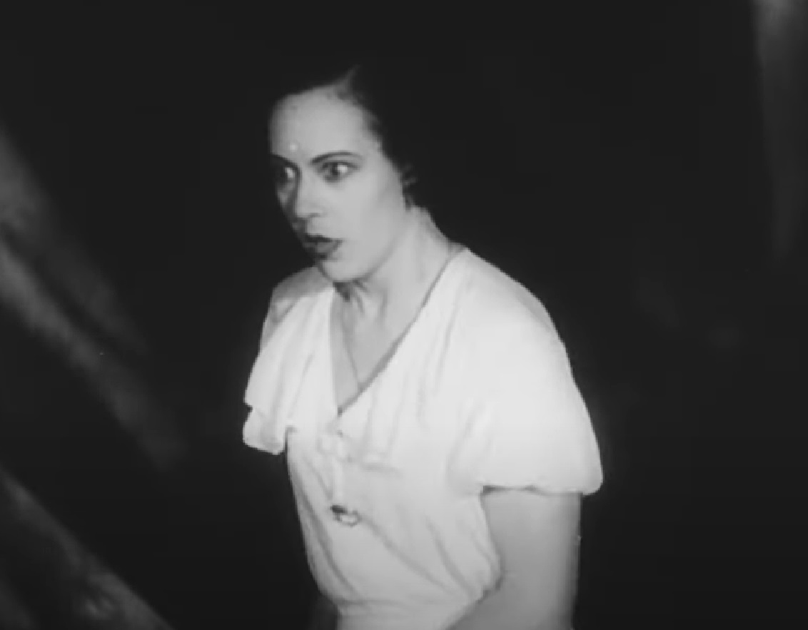Screenshot of Fredi Washington looking upset - from Ouanga (1936)
