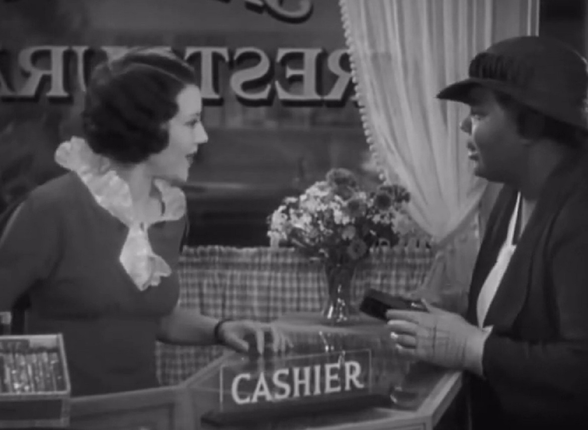Screenshot of Fredi Washington talking at store - from Imitation of Life (1934)