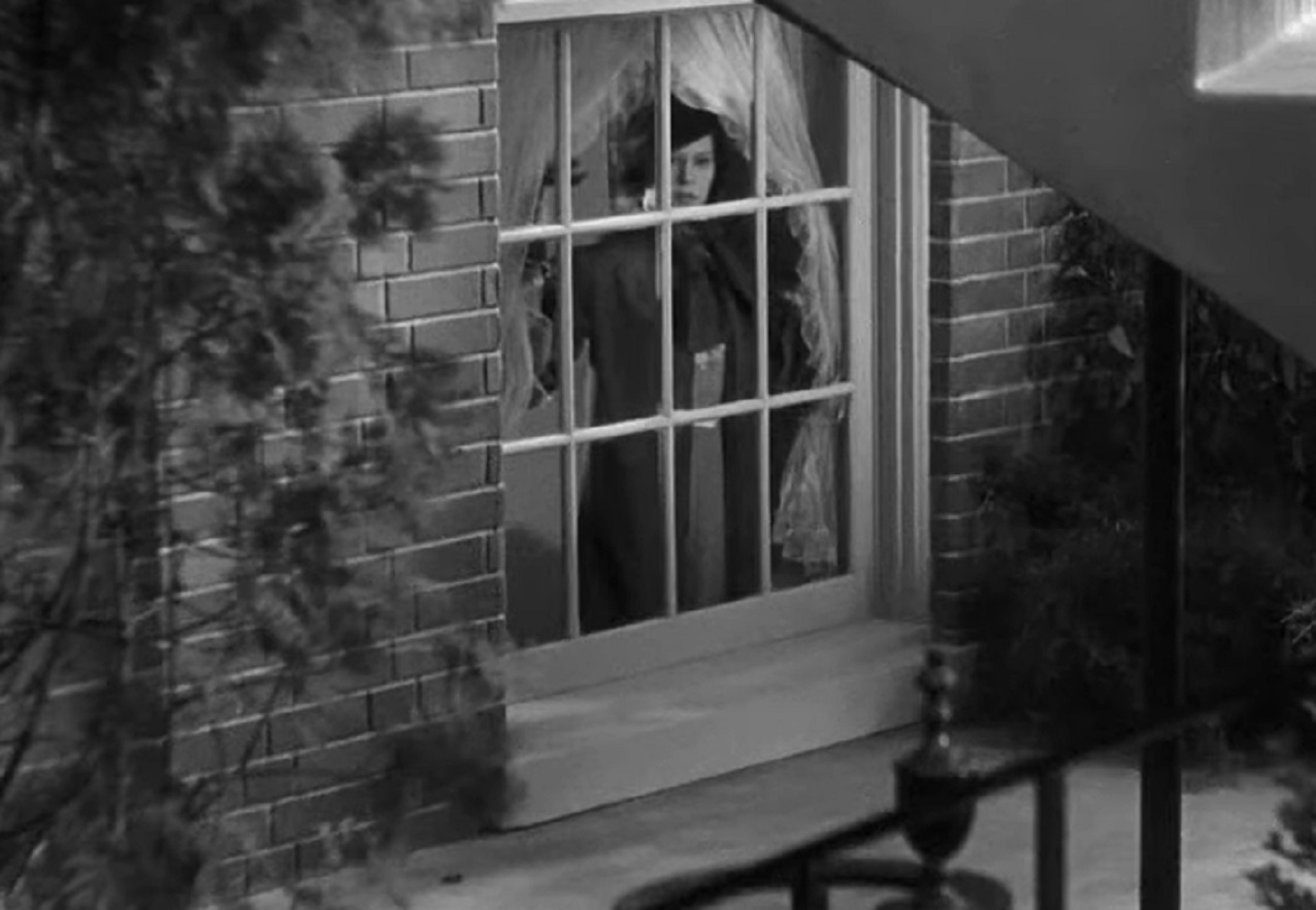 Screenshot of Fredi Washington looking from the window - from Imitation of Life (1934)