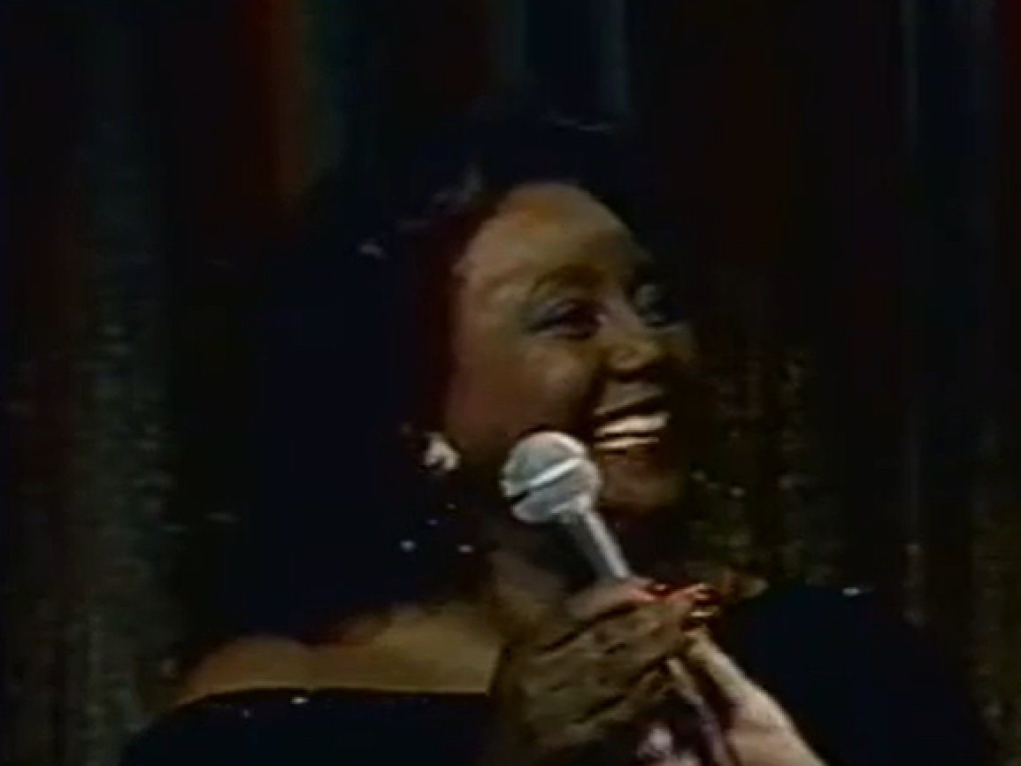 Screenshot of Joyce Bryant smiling at stage - from The David Susskind Show - (1958–1987)
