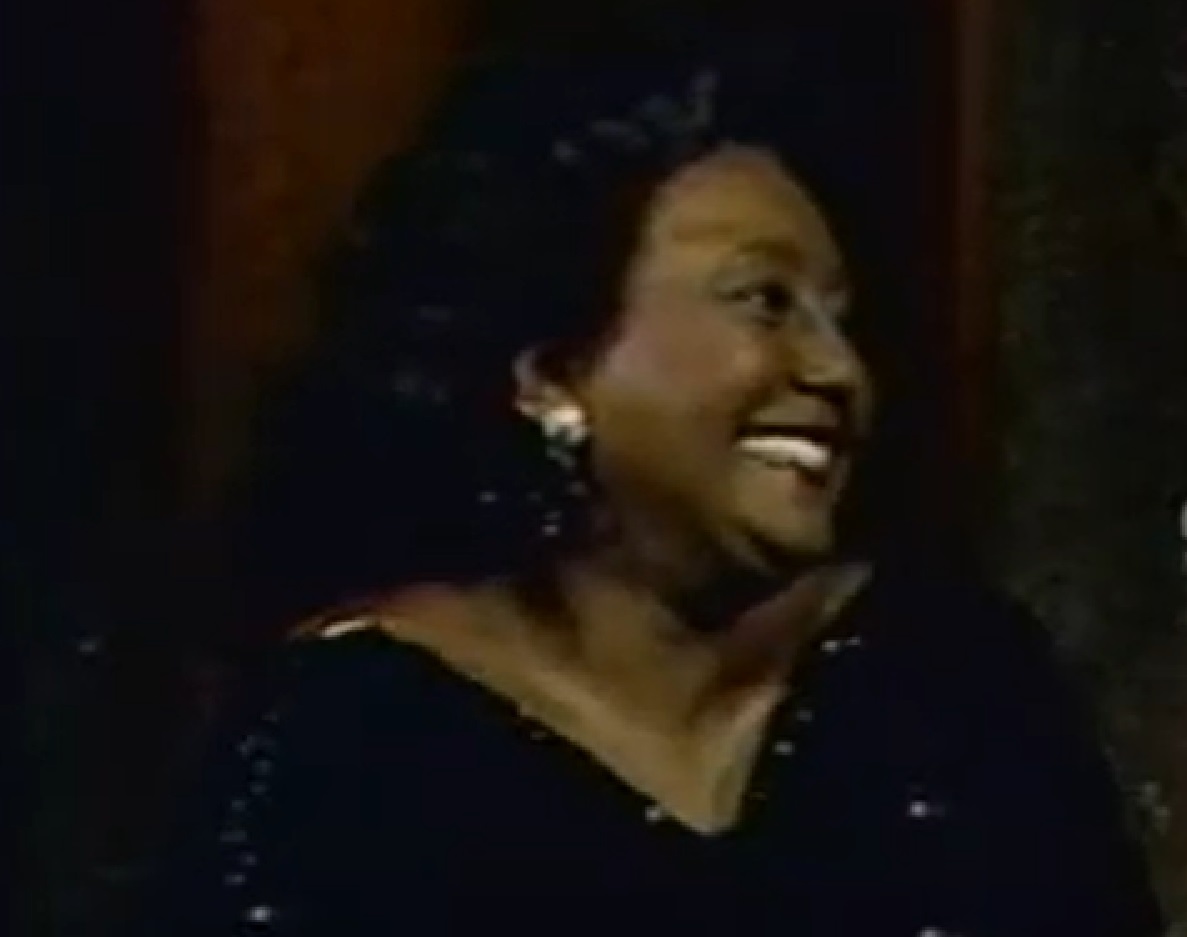 Screenshot of Joyce Bryant pointing smiling - from The David Susskind Show - (1958–1987)