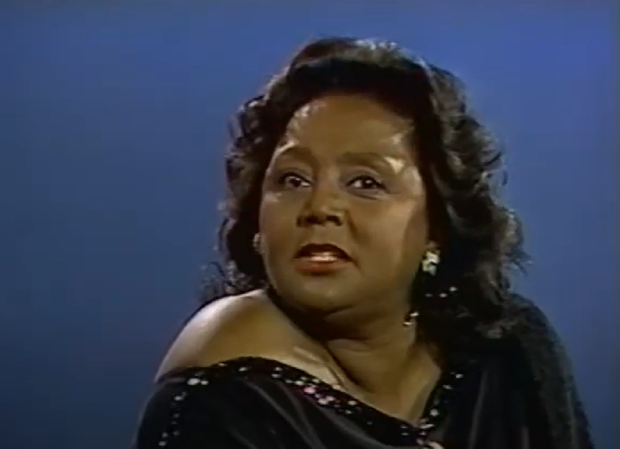 Screenshot of Joyce Bryant looking at side - from The David Susskind Show - (1958–1987)