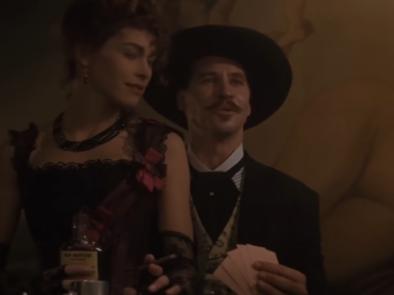 Screenshot of Val Kilmer playing cards - from Tombstone (1993)