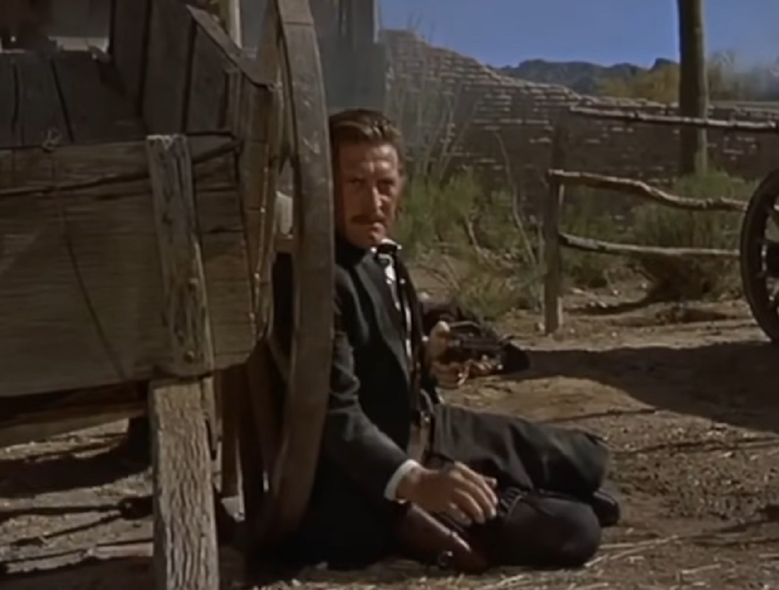Screenshot of Kirk Douglas hiding outside - from Gunfight at the O.K. Corral (1957)