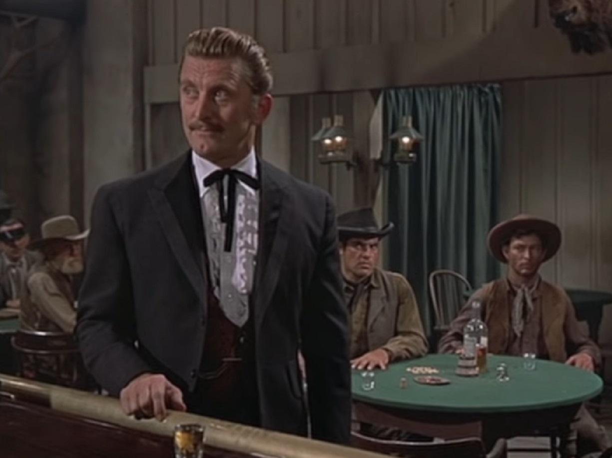 Screenshot of Kirk Douglas standing in saloon - from Gunfight at the O.K. Corral (1957)