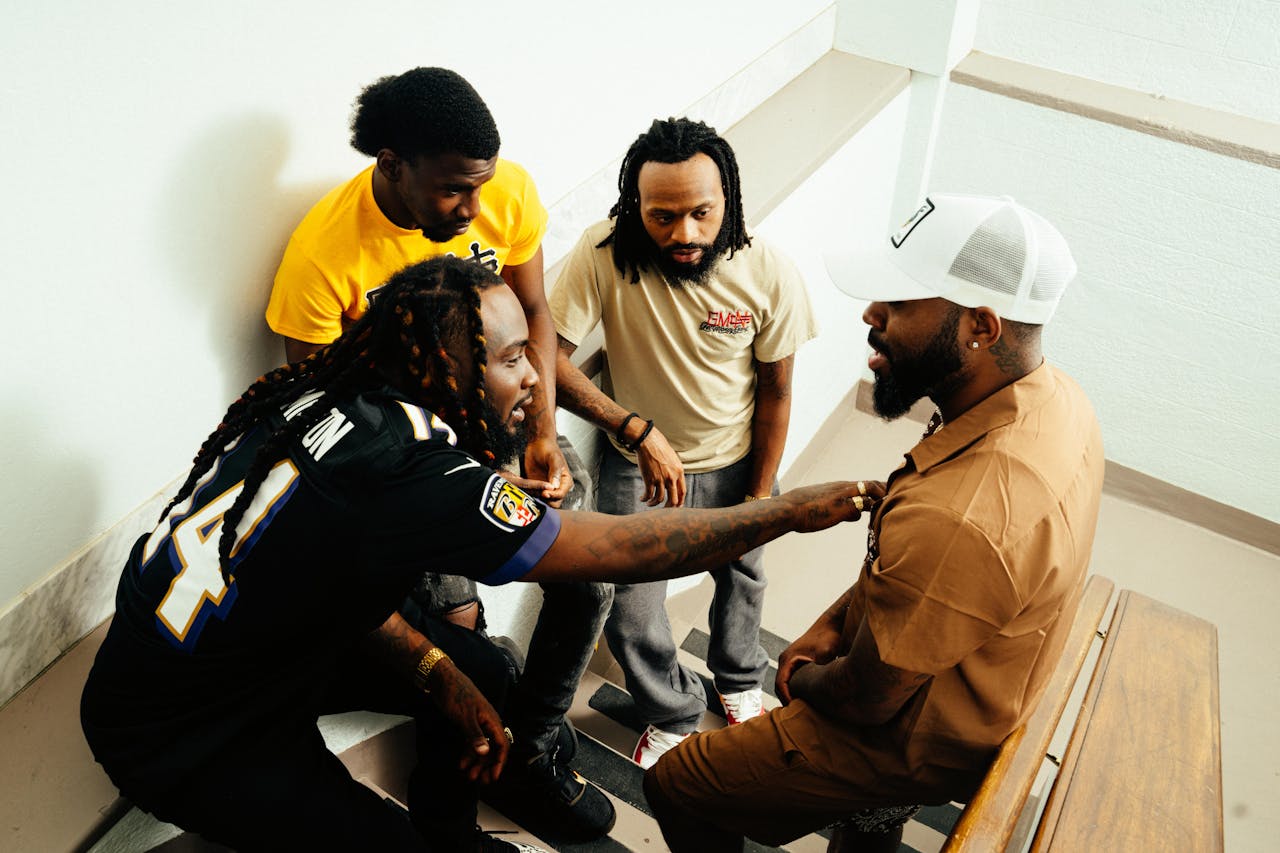Friends Discussing on the Staircase