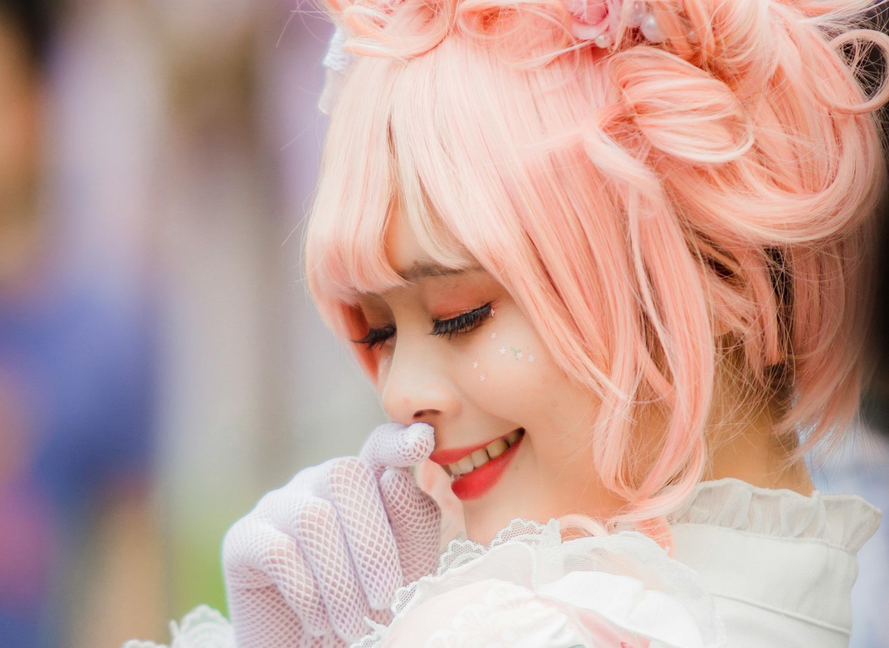 Close-Up Photo Of Woman With Pink Hair