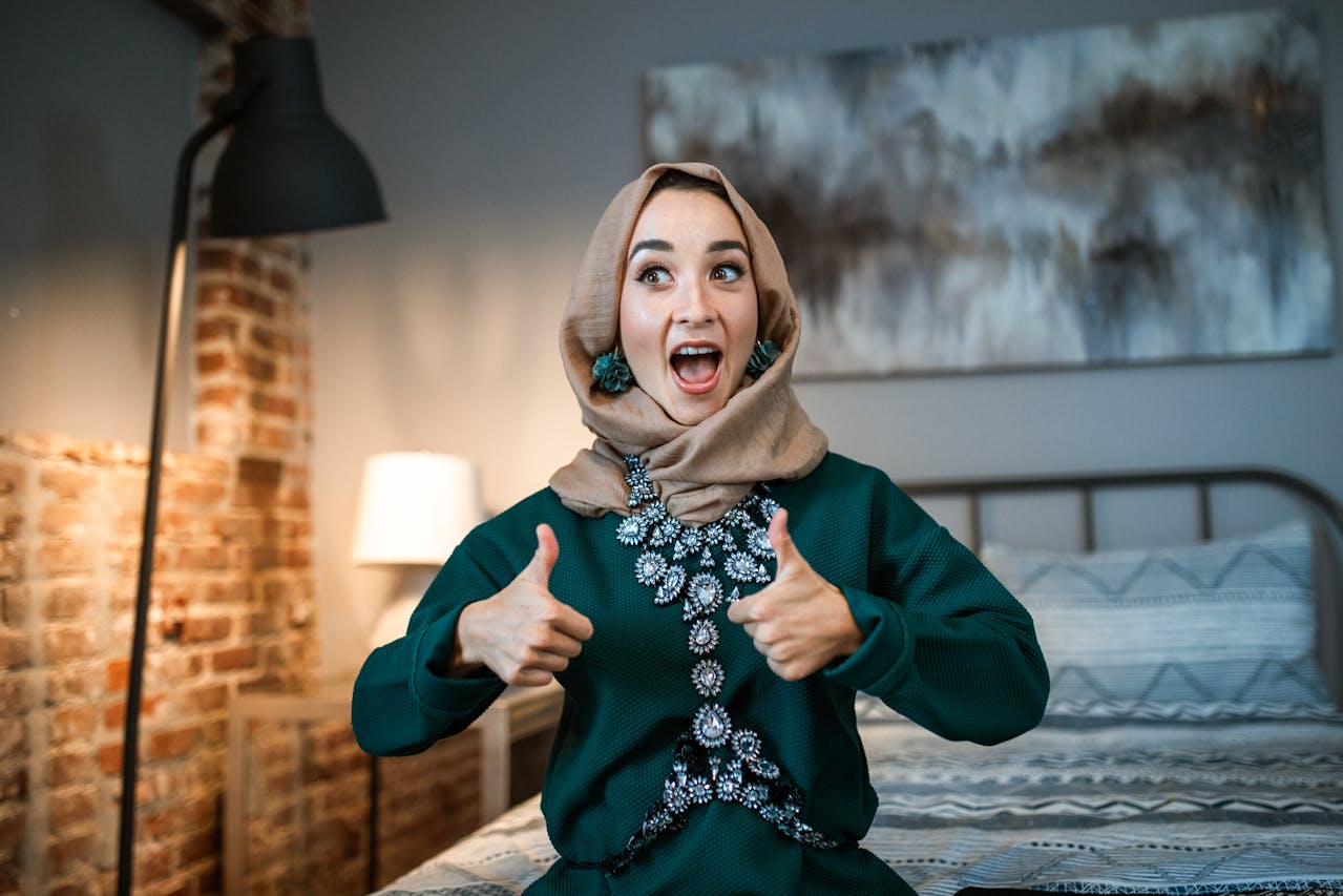 A Happy Woman making Thumbs Up