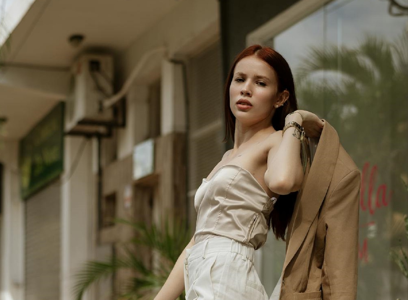 Female Posing on a Sidewalk