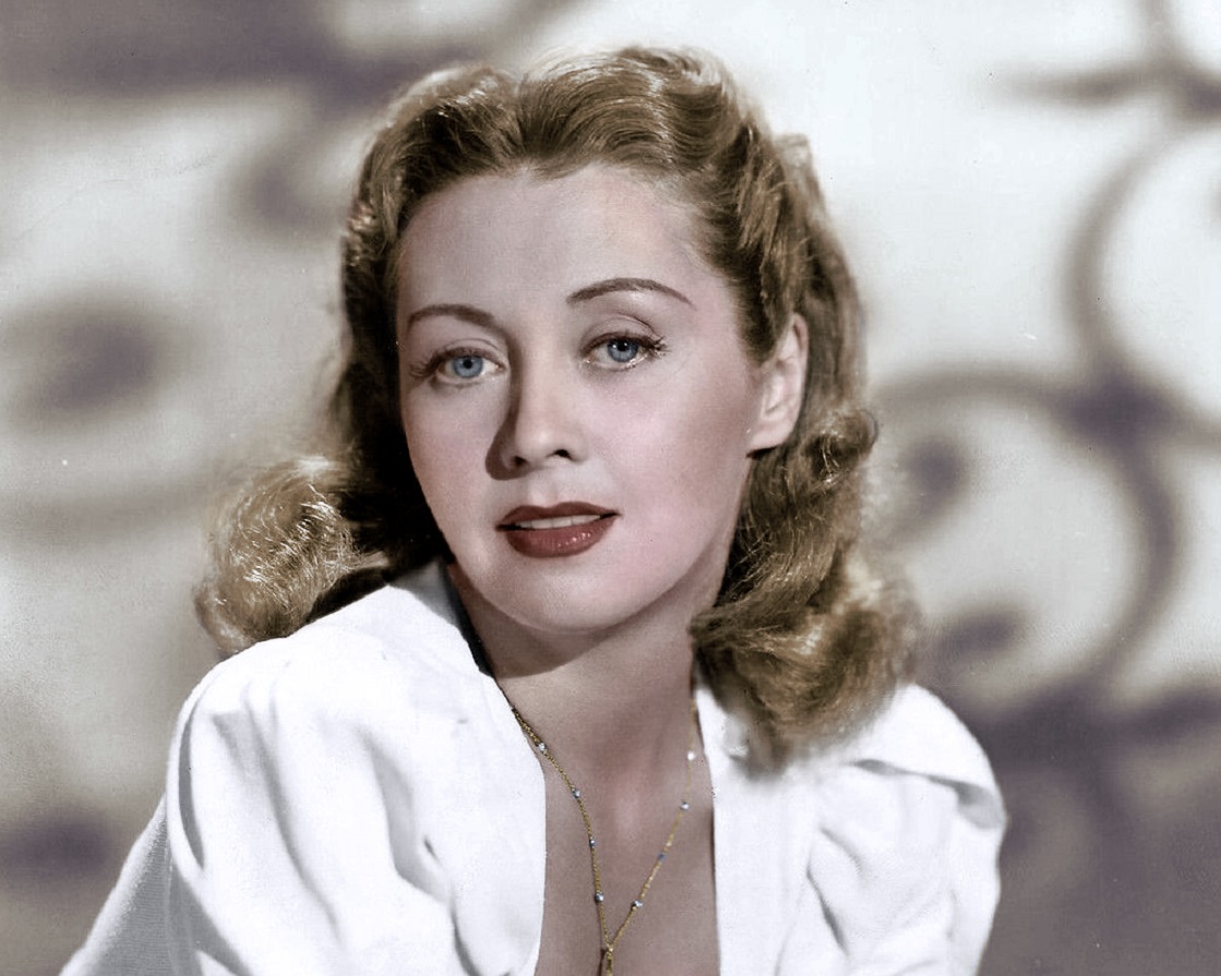 Portrait of Joan Blondell looking at camera.