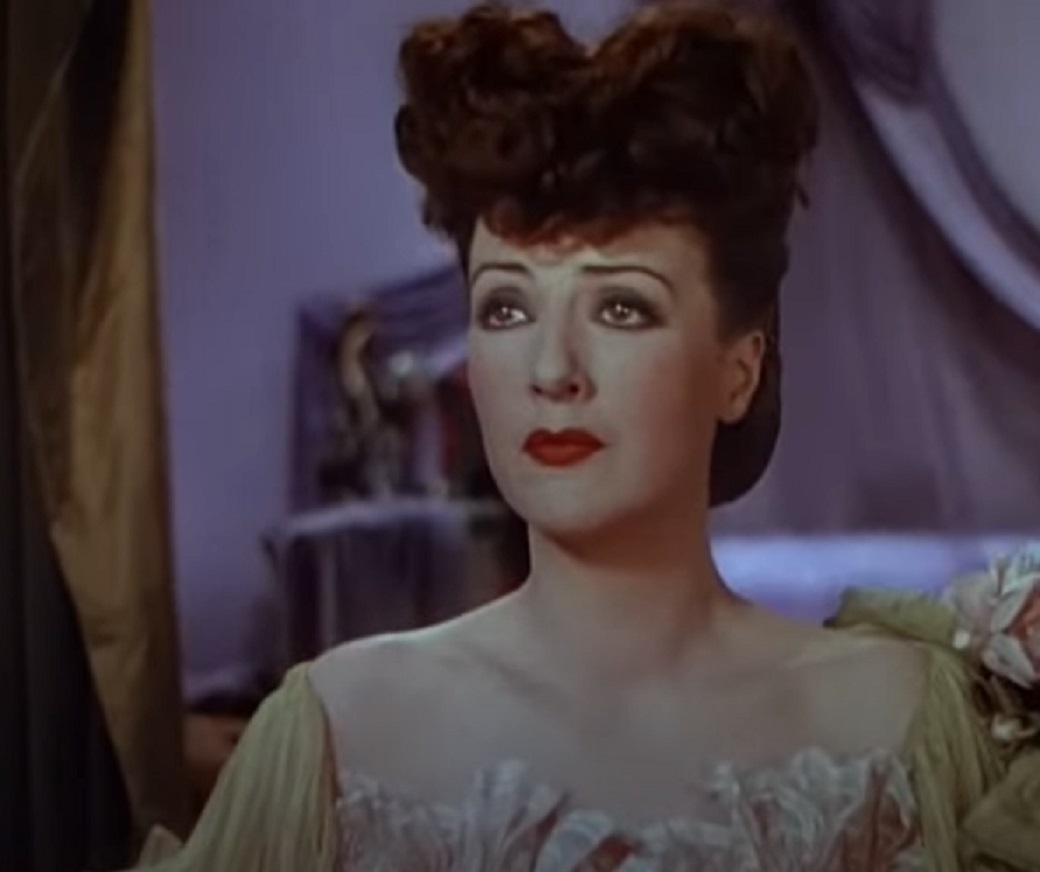 Screenshot of Gypsy Rose Lee looking at side sad from - Belle of the Yukon (1944)