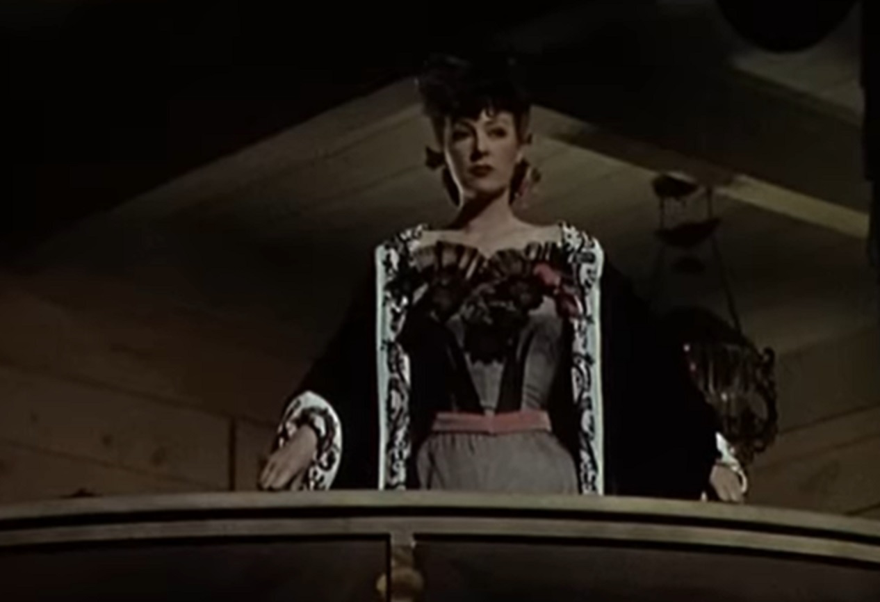 Screenshot of Gypsy Rose Lee looking down from - Belle of the Yukon (1944)