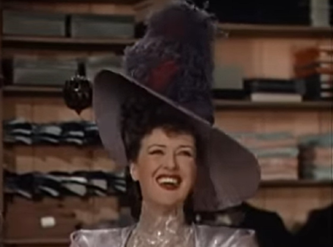 Screenshot of Gypsy Rose Lee smiling from - Belle of the Yukon (1944)