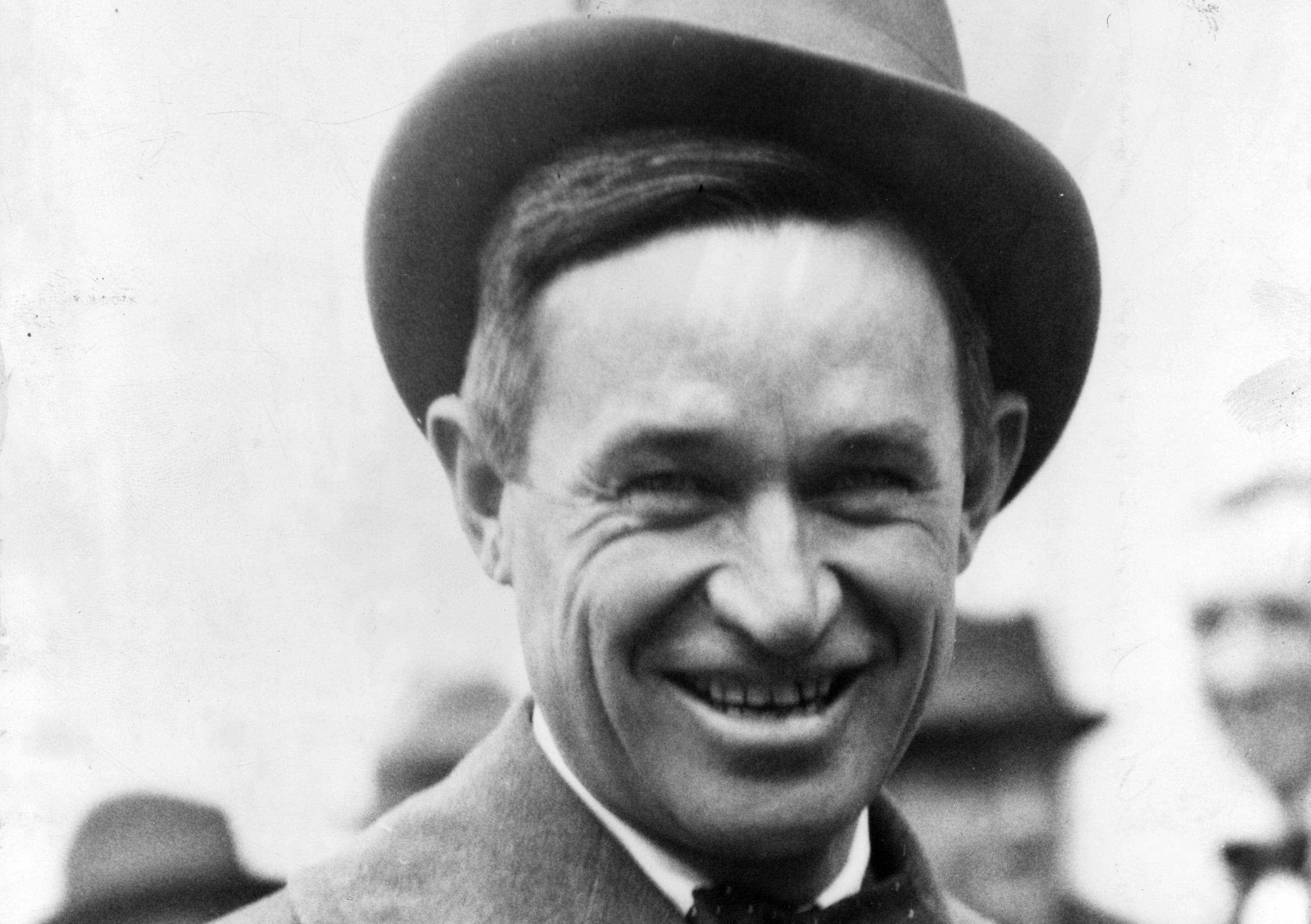 Will Rogers in suit and a hat