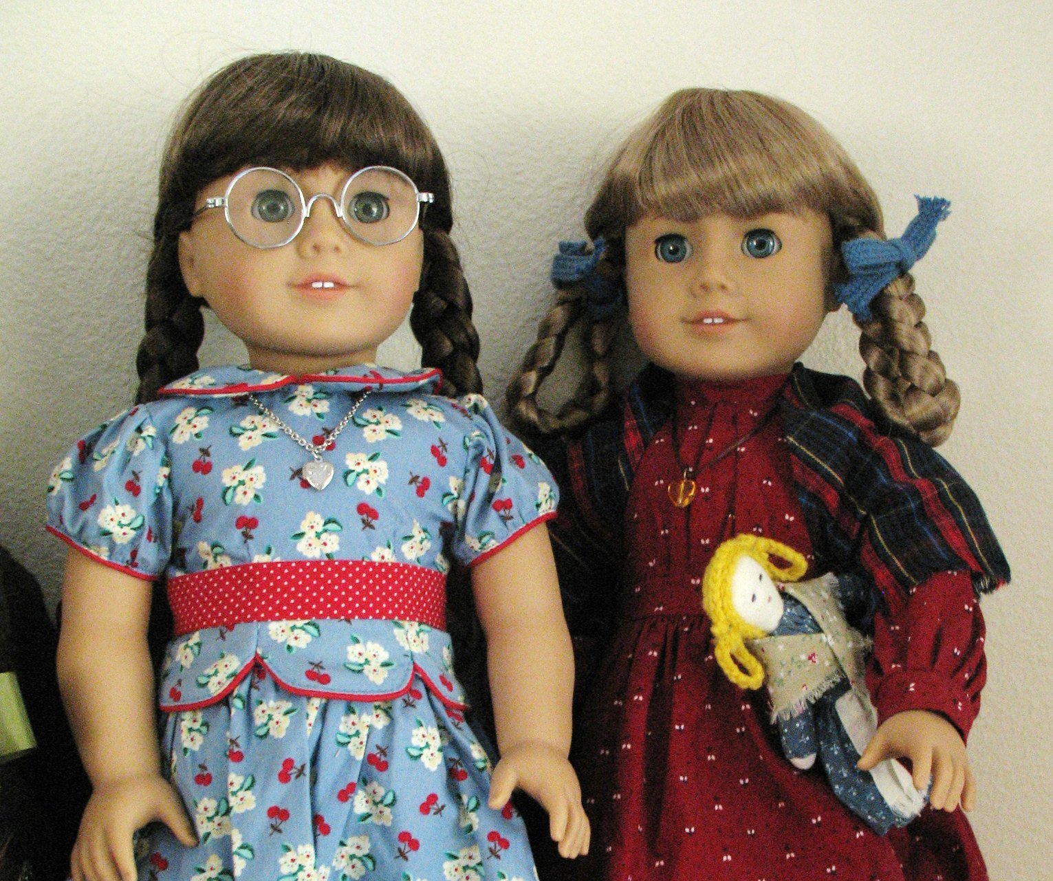 Close Up Photo of American Girl dolls, Molly and Kirsten.