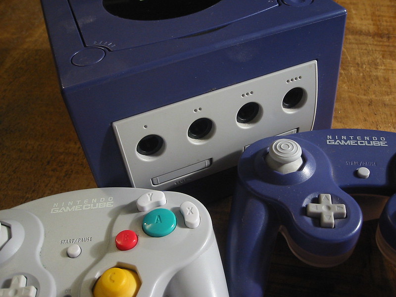 Close Up Photo of Nintendo Gamecube placed on a wooden surface