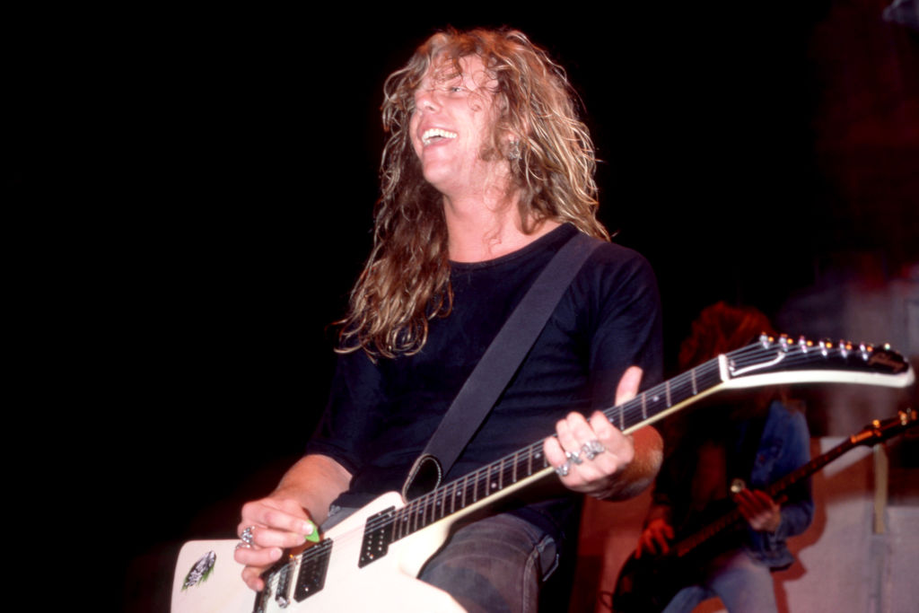 James Hetfield plays on stage