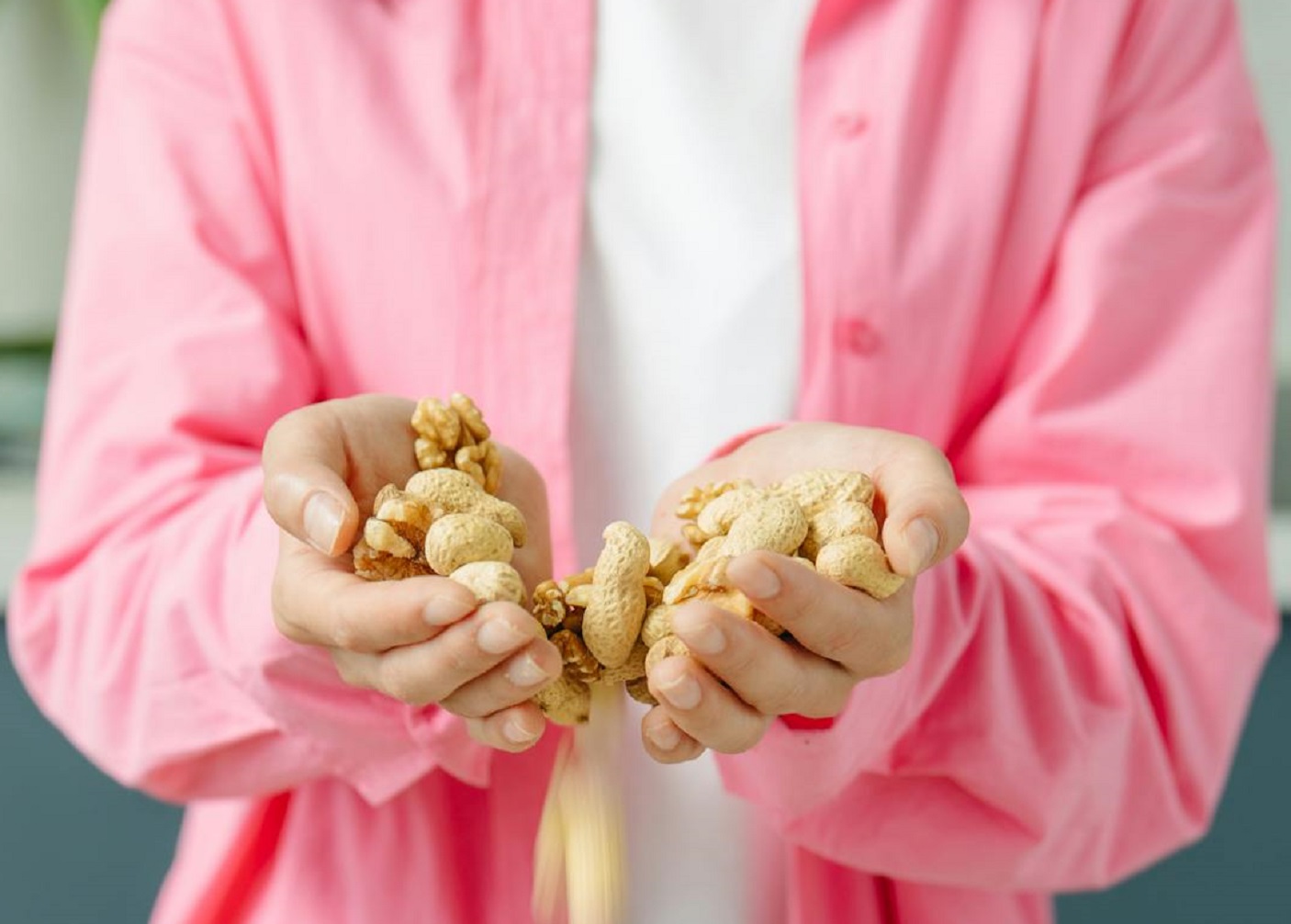 Woman Holding Peanuts