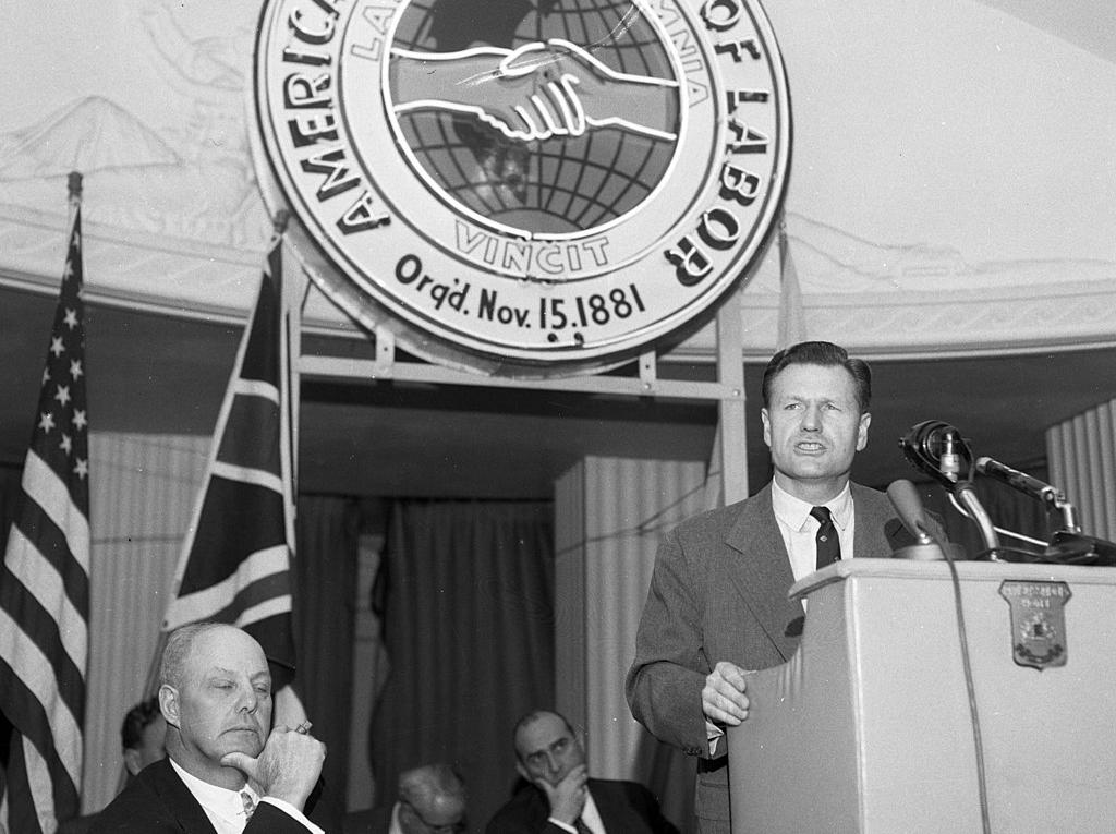 Nelson Rockefeller speaks at AFL convention as union President George Meany looks on