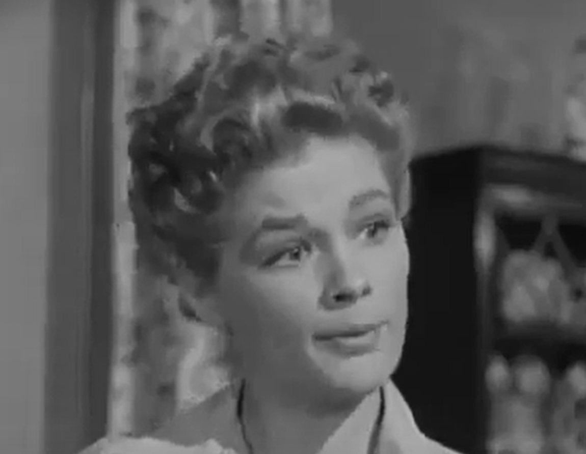 Screenshot of Jean Hagen looking at side - from Half A Hero (1953)