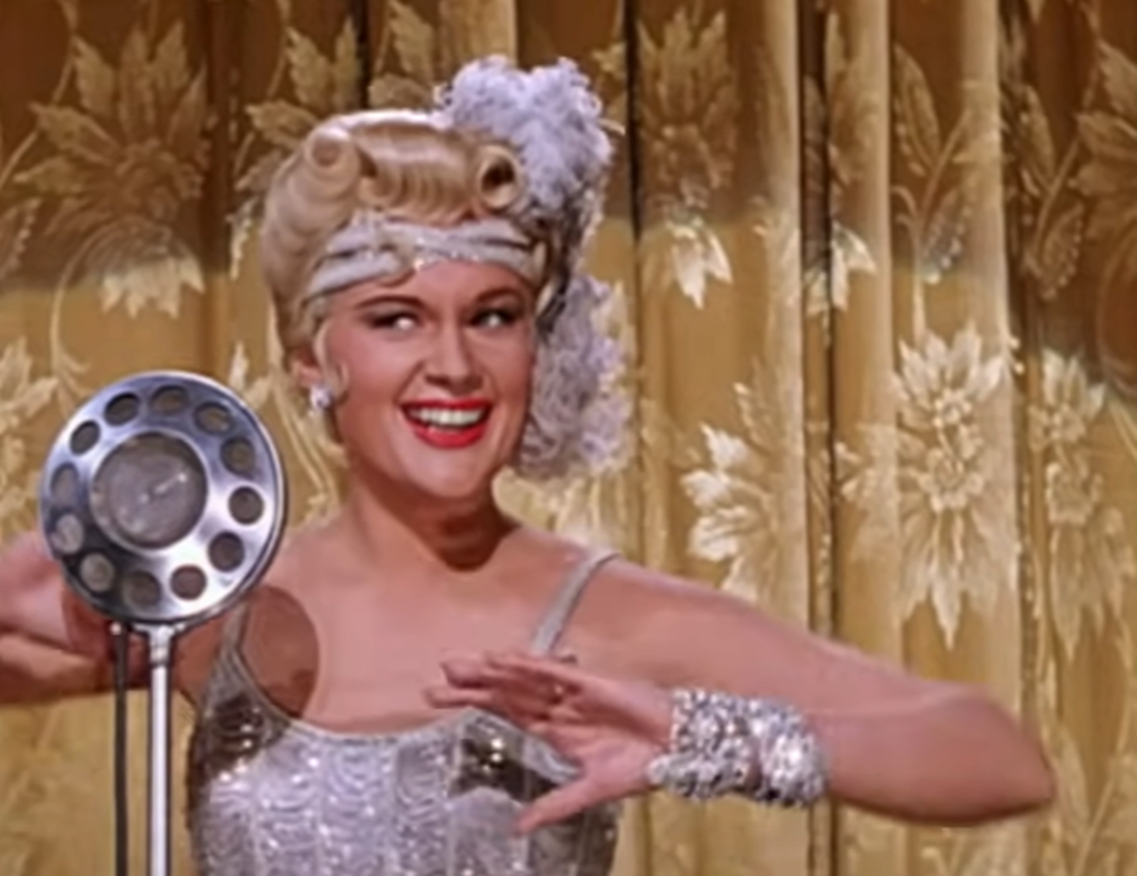Screenshot of Jean Hagen performing on stage - from Singin' In The Rain (1952)