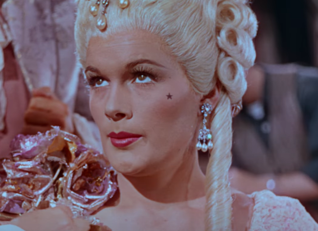 Screenshot of Jean Hagen looking at side on stage - from Singin' In The Rain (1952)