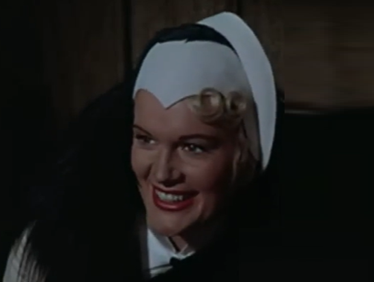 Screenshot of Jean Hagen smiling  - from Singin' in the Rain (1952)