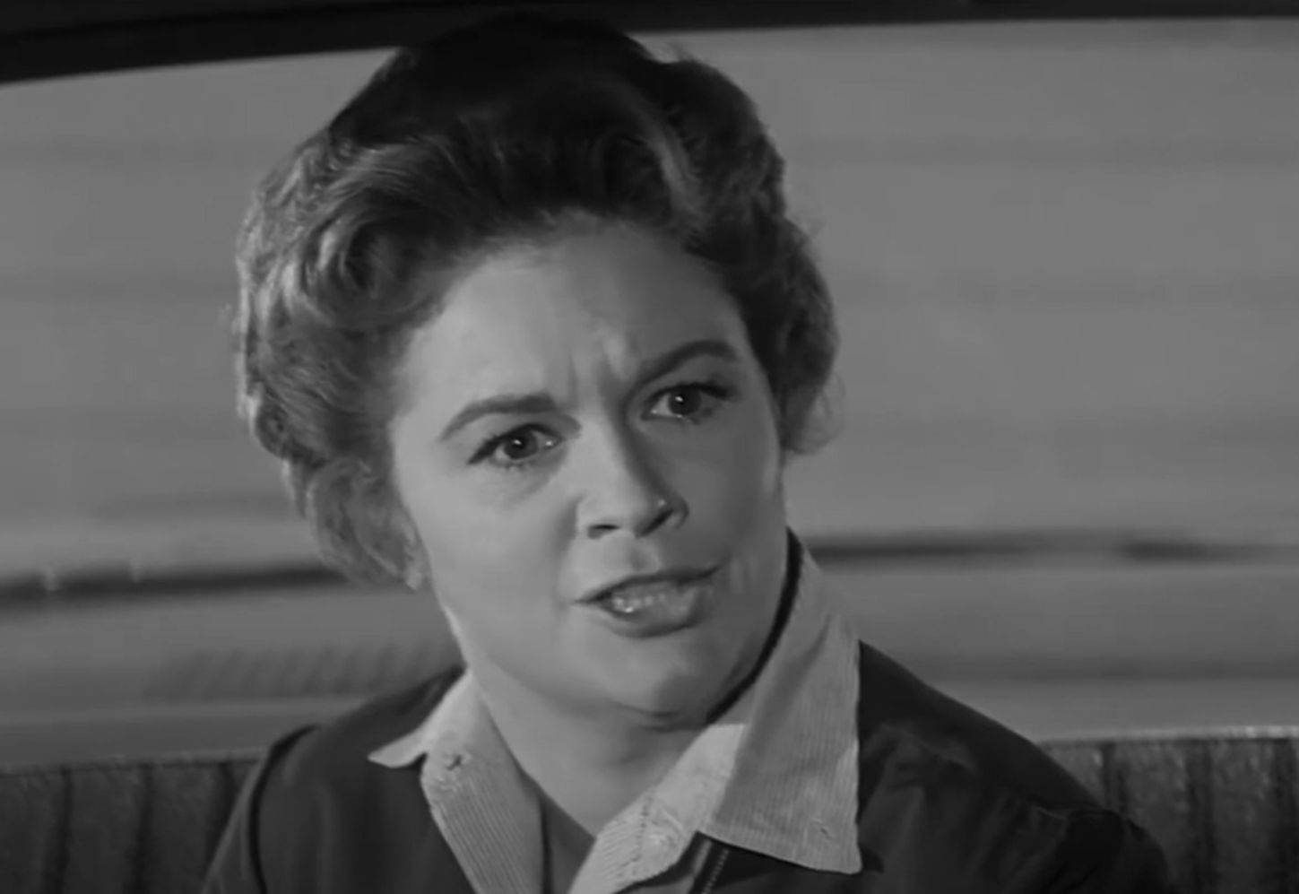 Screenshot of Jean Hagen seating looking sad - from Panic in Year Zero (1962)