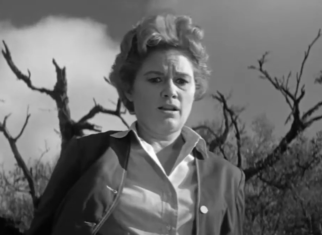 Screenshot of Jean Hagen seating looking sad - from Panic in Year Zero (1962)