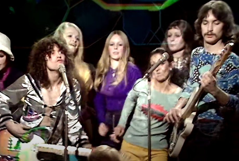 portrait of Marc bolan playing guitar