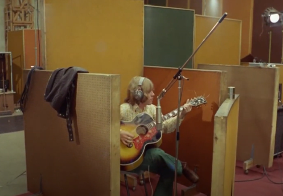 image of Brian jones playing guitar