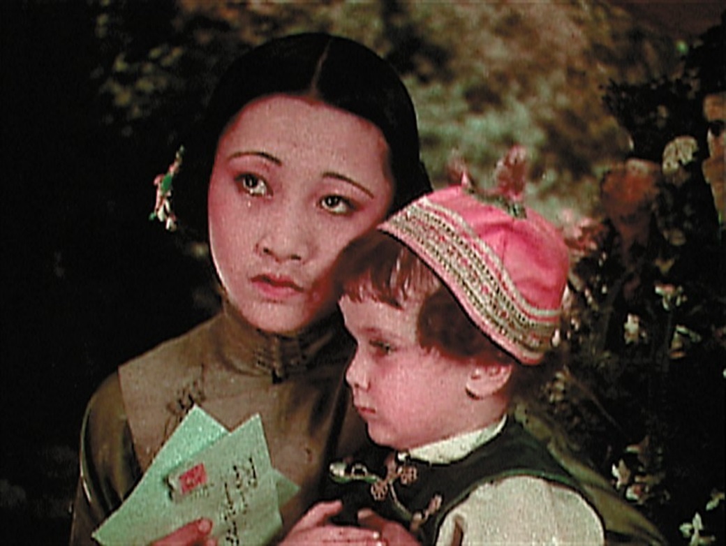 Anna May Wong in Toll Of Thesea Withbaby - 1922