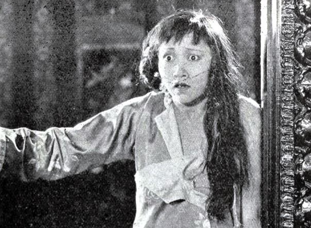 Still from the American silent drama film Drifting (1923) with Anna May Wong