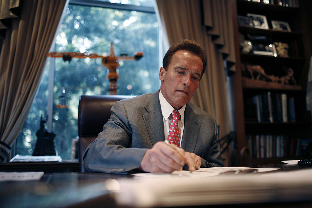 Governor Arnold Schwarzenegger working at his offices
