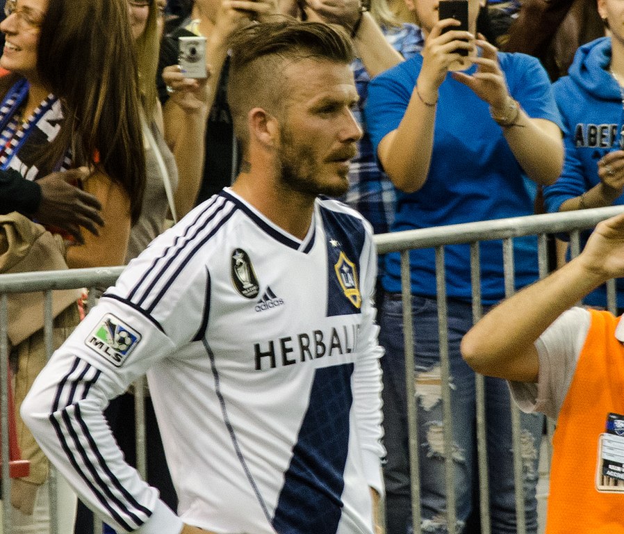 David Beckham waits to take a corner kick