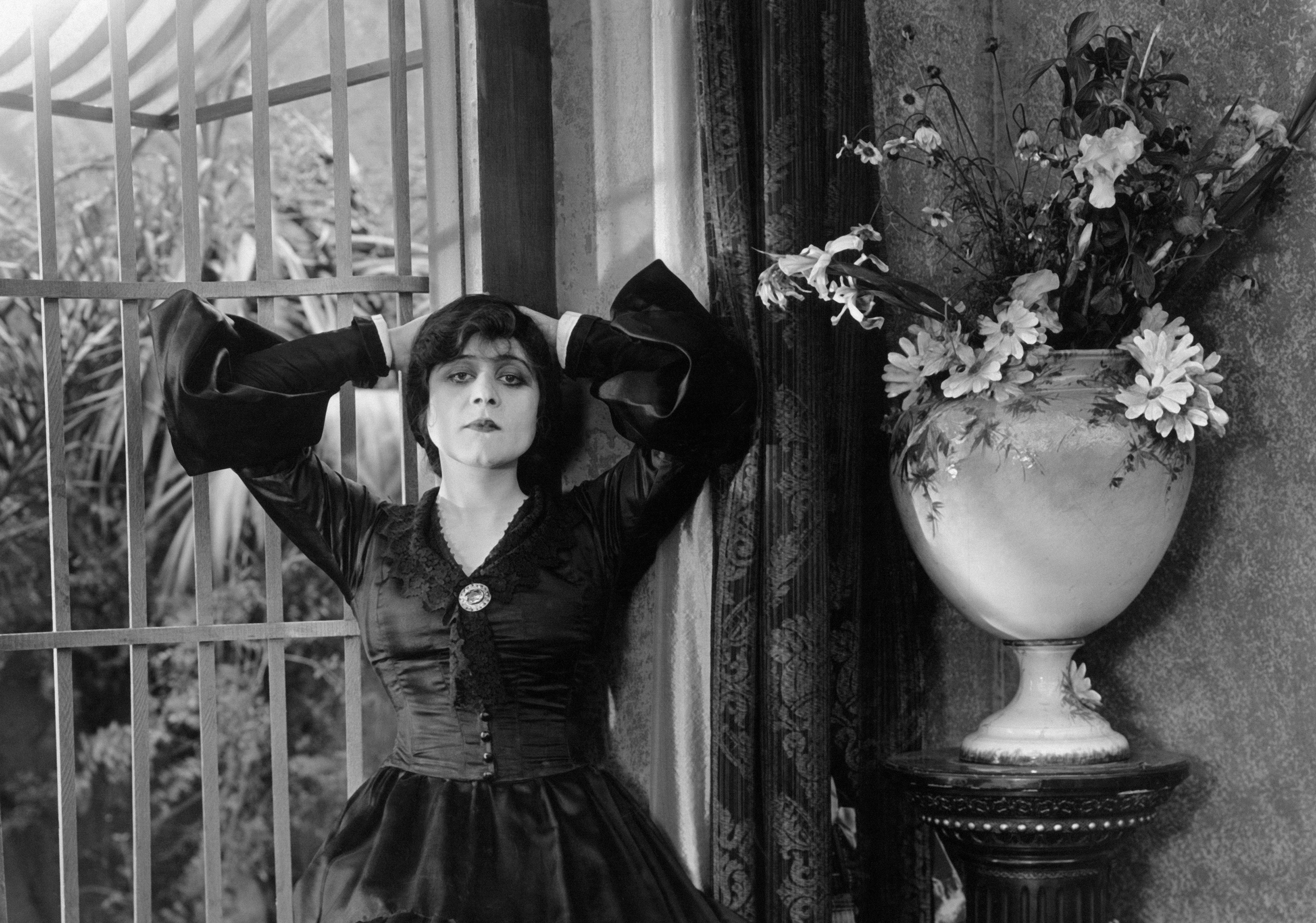 Theda Bara in black dress
