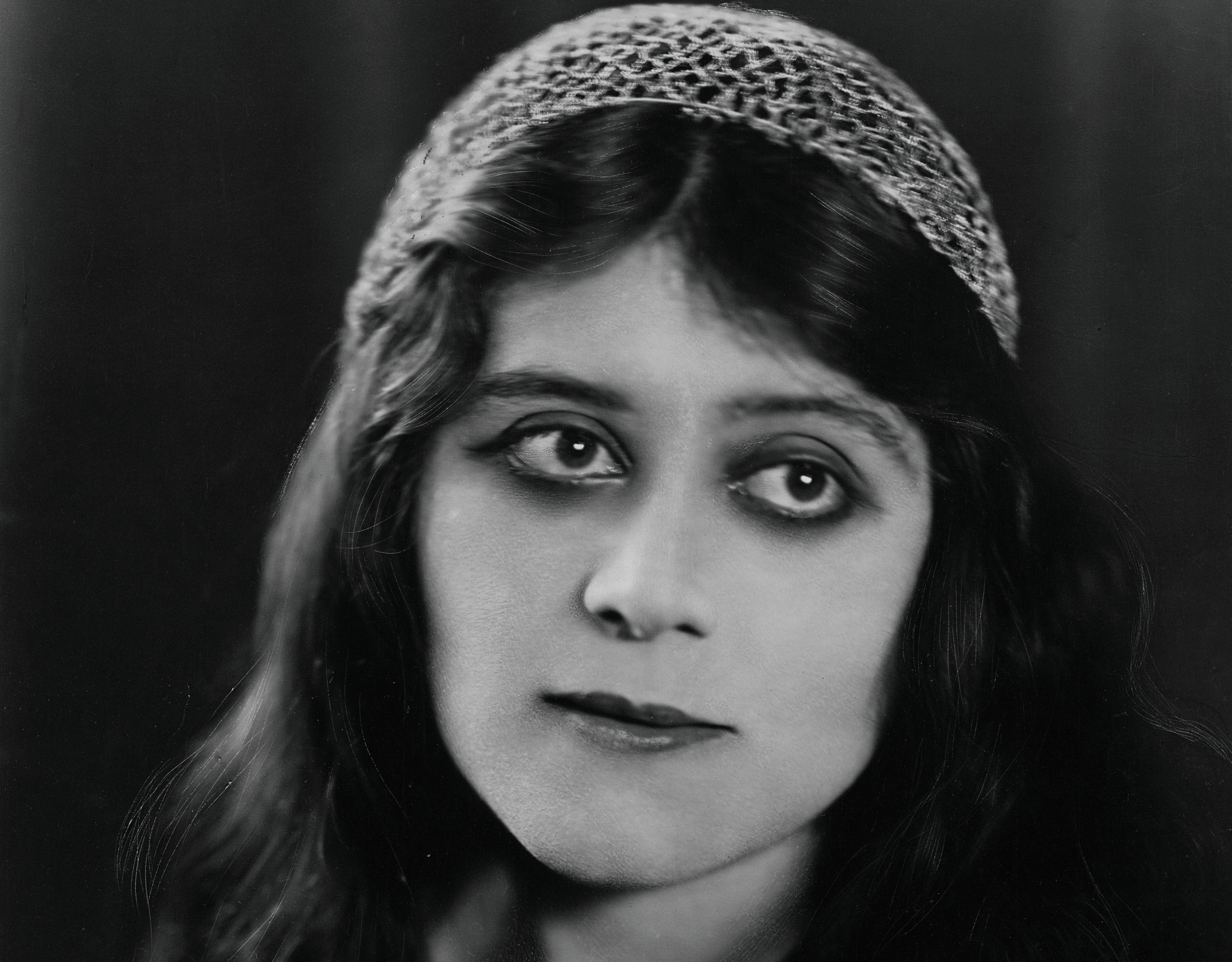 Theda Bara wearing head scarf