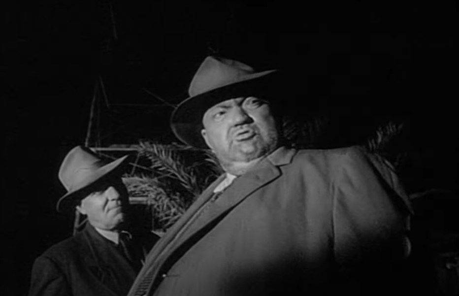 Orson Welles as  Police Captain Hank Quinlan