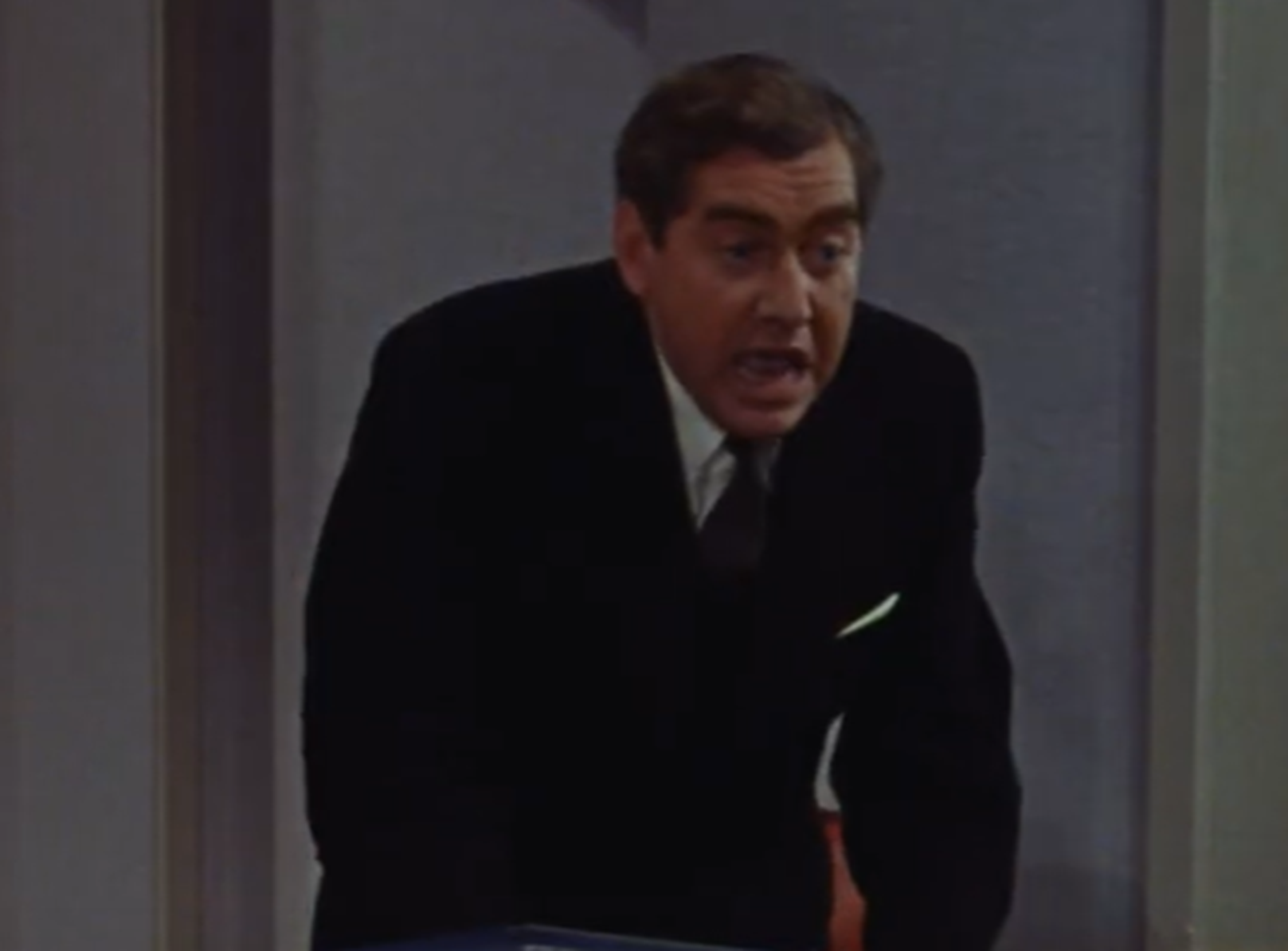 Screenshot of Tony Hancock looking at camera  - from The Rebel (1961)