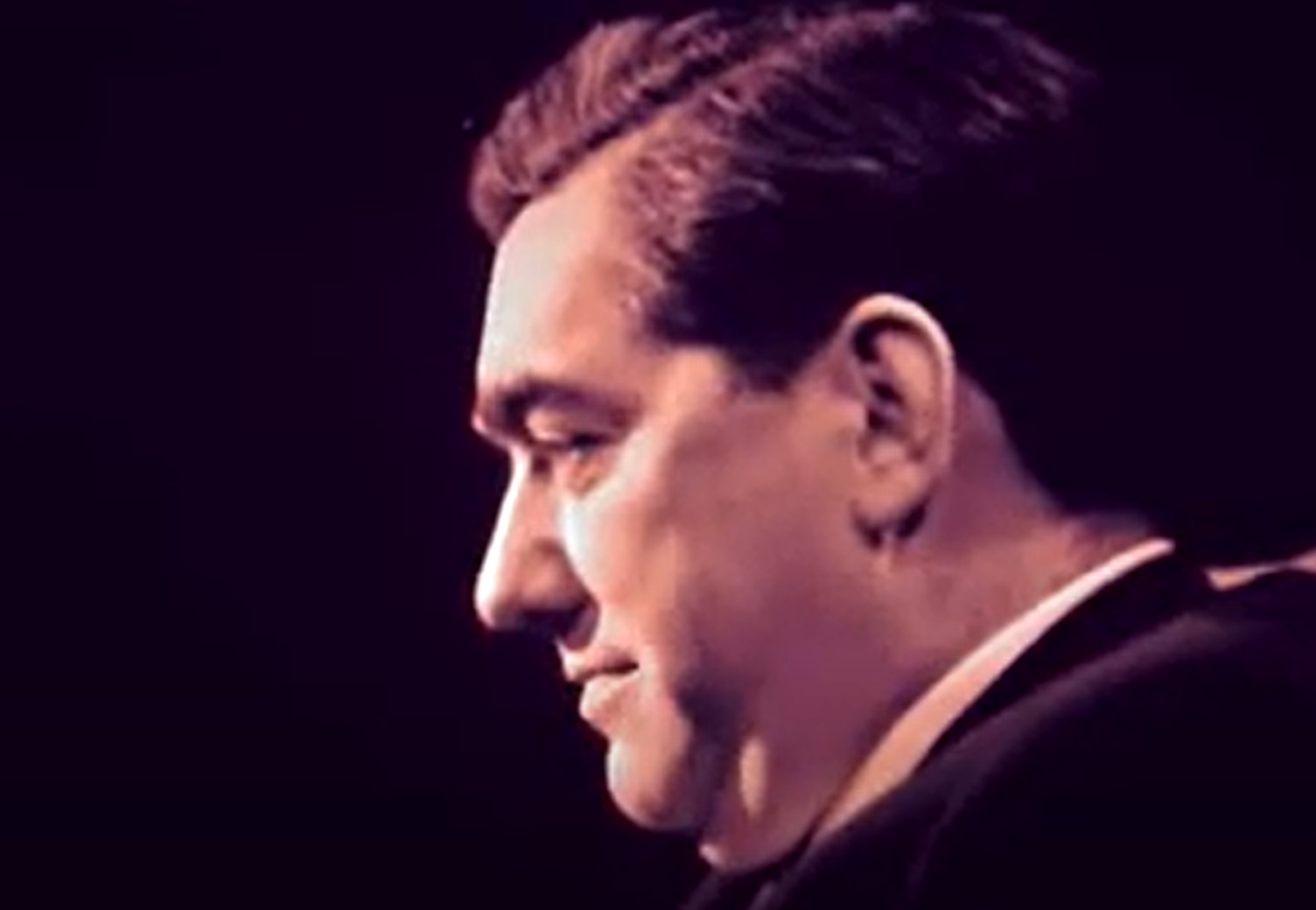 Screenshot of Tony Hancock looking at camera  - from Face to Face (1960)