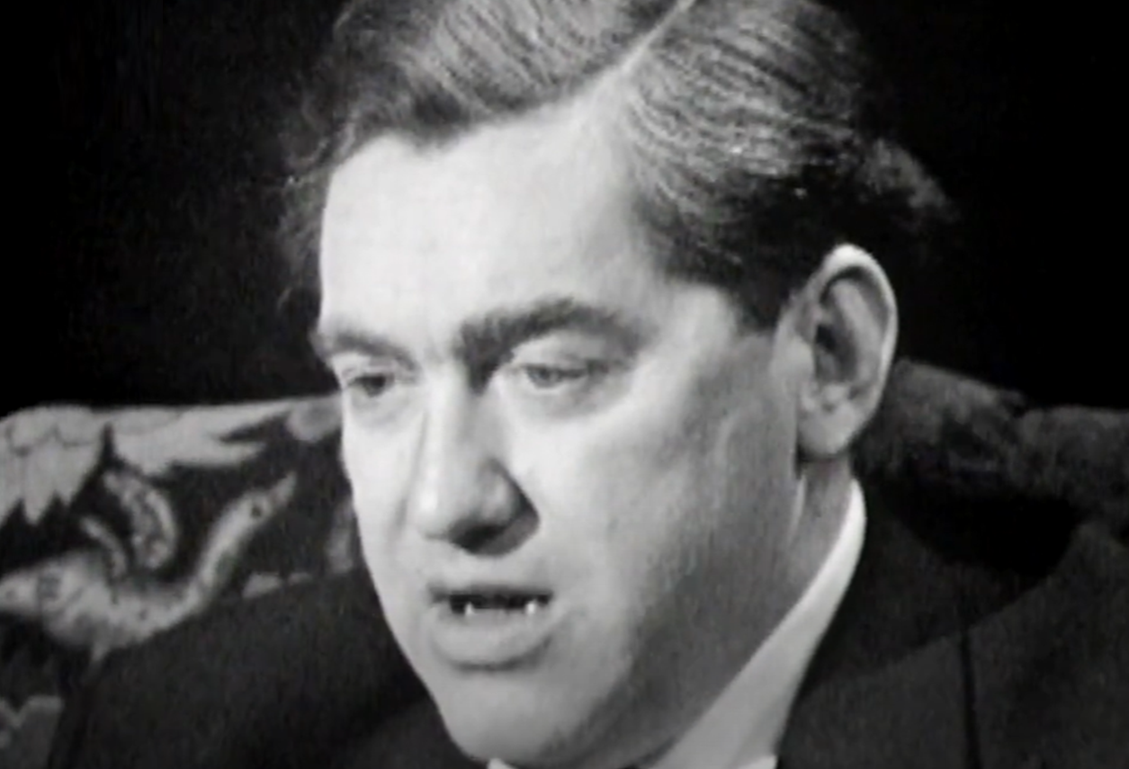 Screenshot of Tony Hancock looking down - from Face to Face (1960)