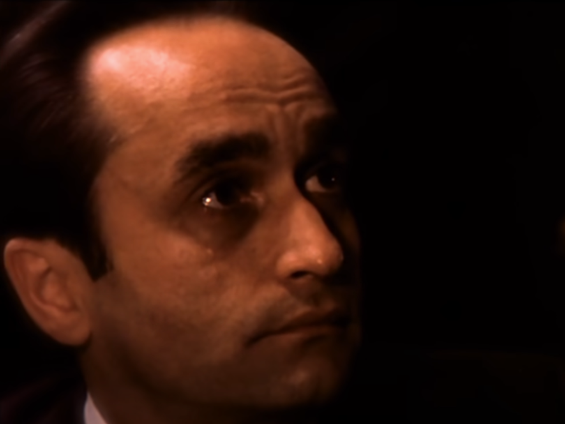 Screenshot of John Cazale looking at side from The Godfather Part II (1974)