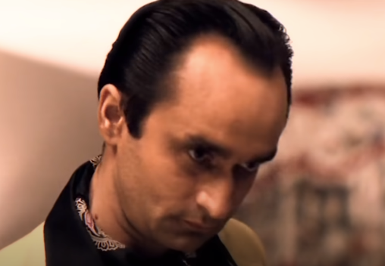 Screenshot of John Cazale looking at front from The Godfather Part II (1974)