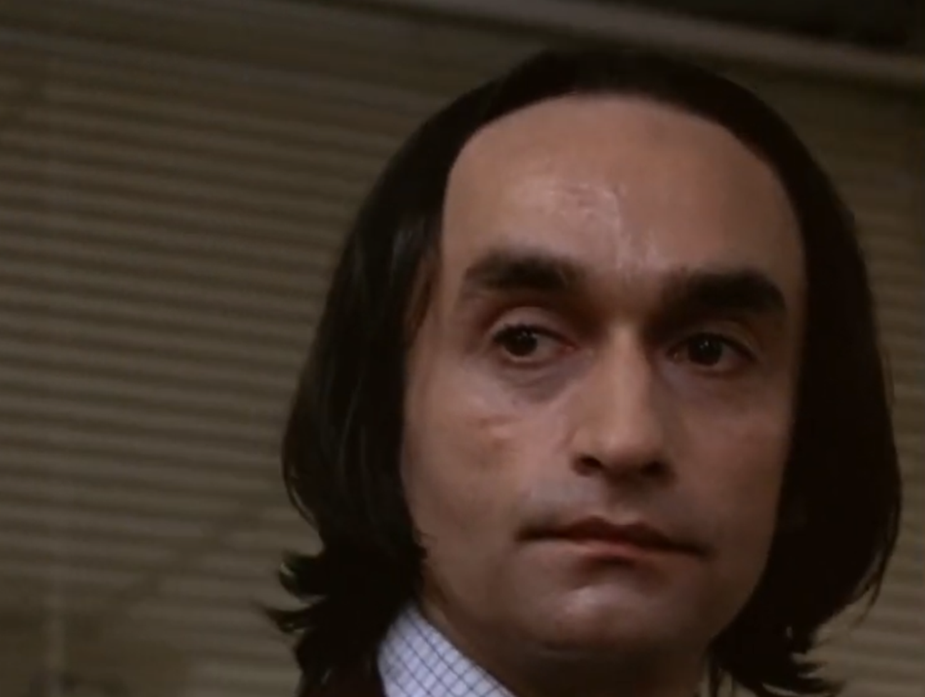 Screenshot of John Cazale looking at camera from - Dog Day Afternoon (1975)