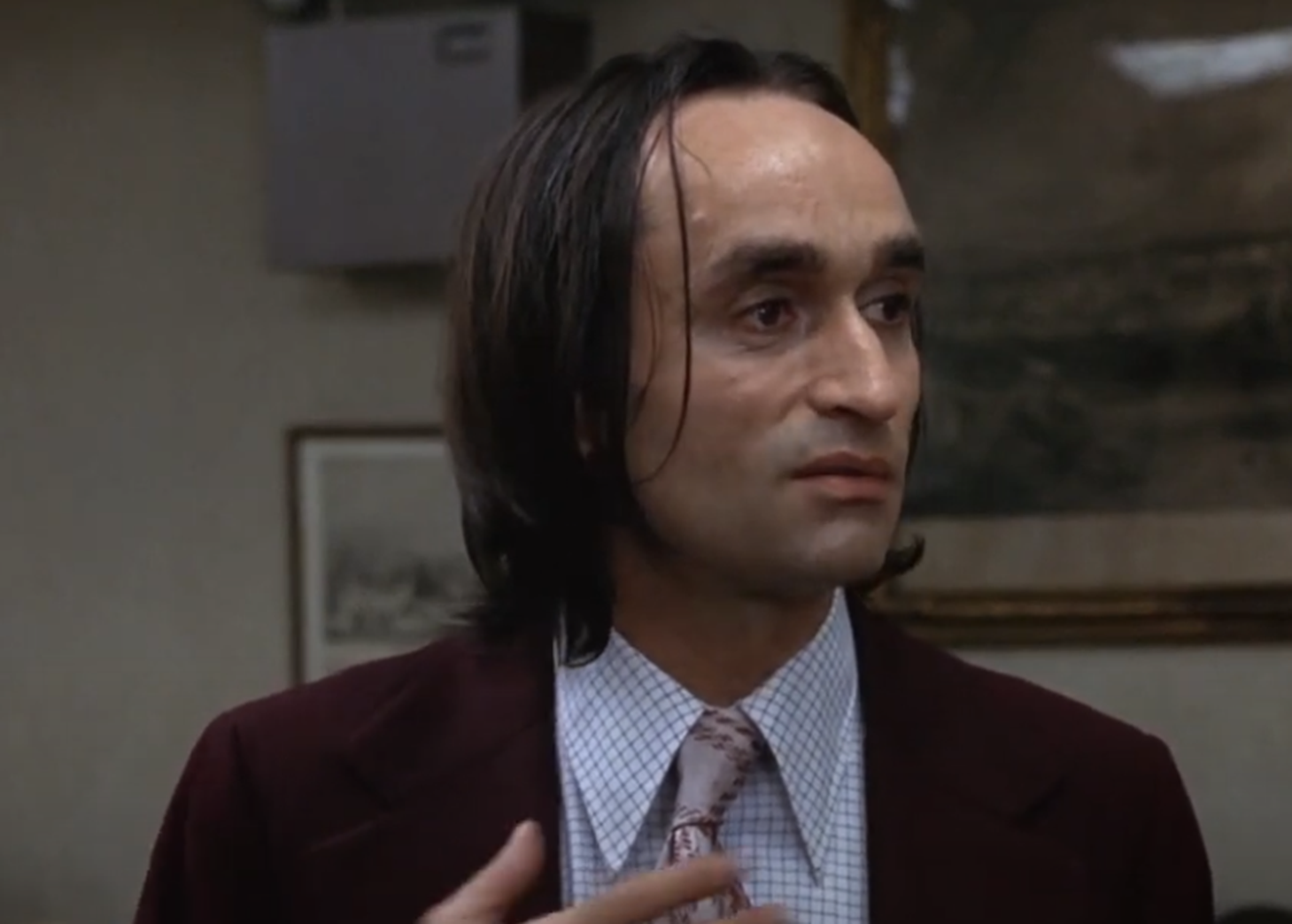 Screenshot of John Cazale looking at side scared from - Dog Day Afternoon (1975)