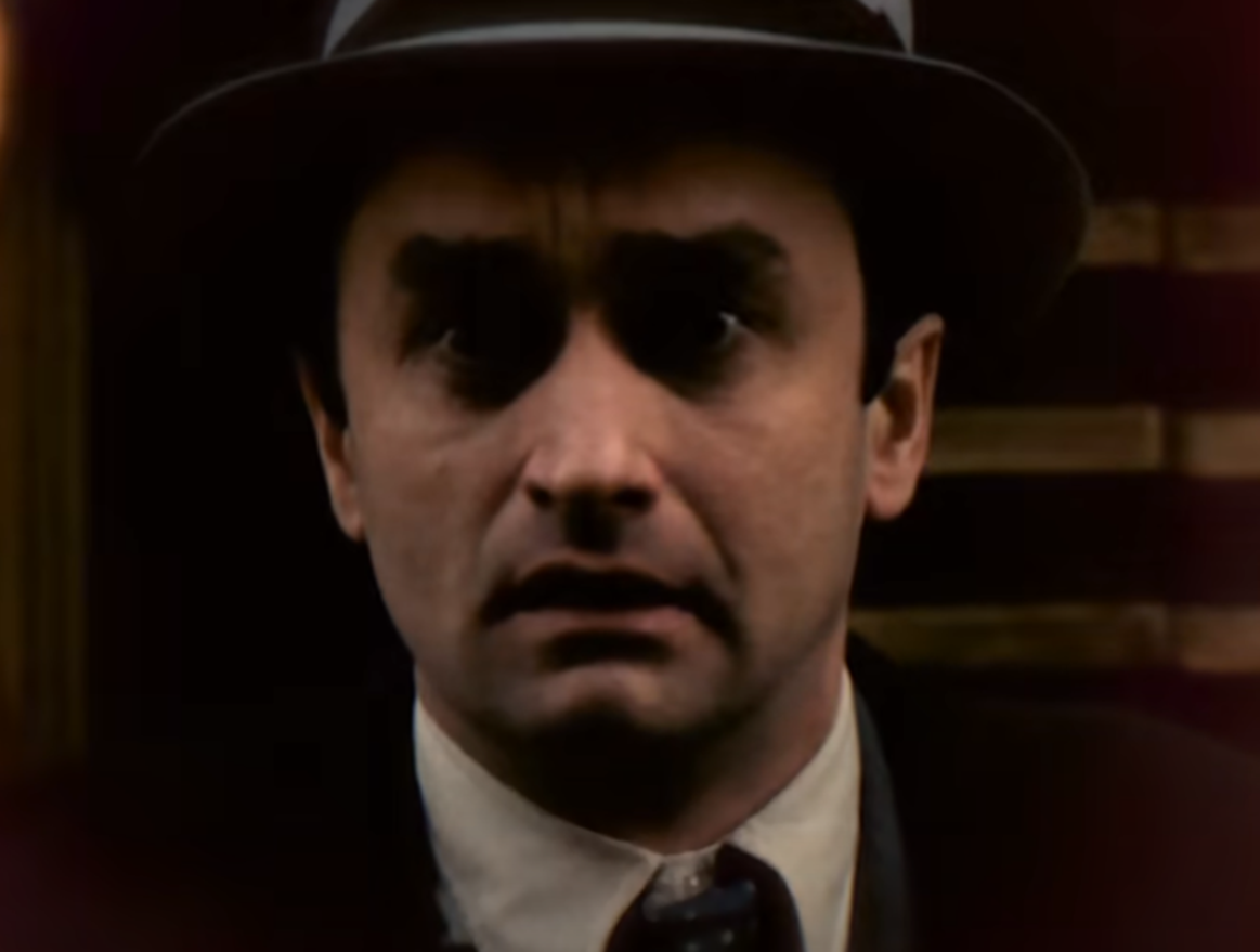 Screenshot of John Cazale looking at front from The Godfather Part II (1974)