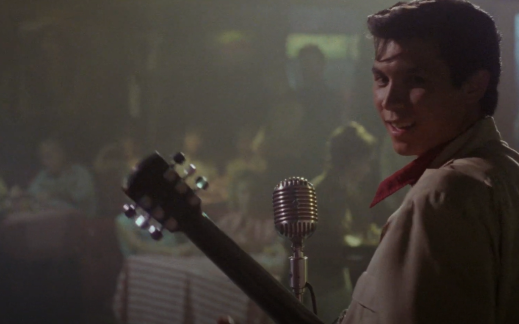 Lou Diamond Phillips as Ritchie Valens in La Bamba performing