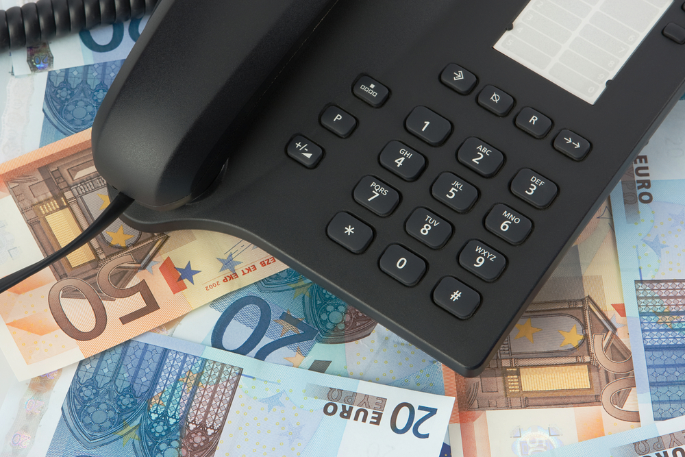 black telephone on money background